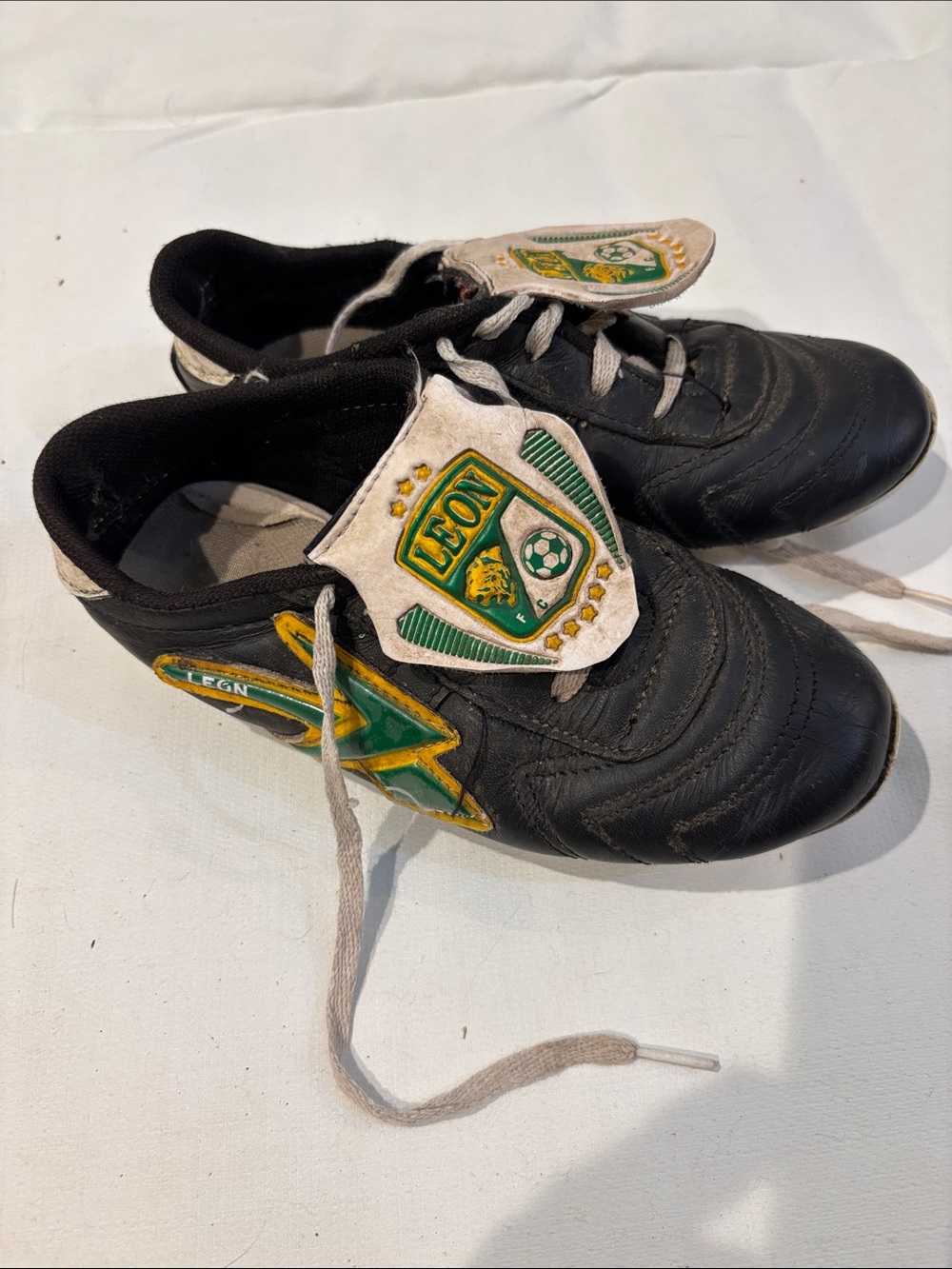 Reebok Black Kids' Soccer cleats with Green and Yellow Accents